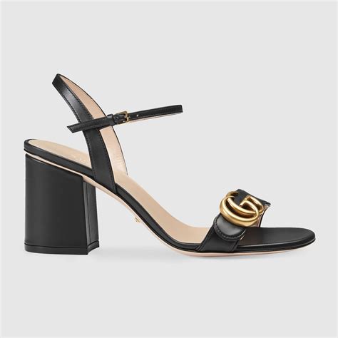 black gucci heeled sandals.